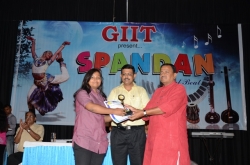 2nd Topper in (BscIT-1) Award to Nidhi Khandelwal by Mr. Dineshanand Goswami with Mr. Om Prakash, Director GIIT